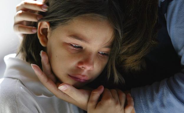 Una niña llorando./Reuters