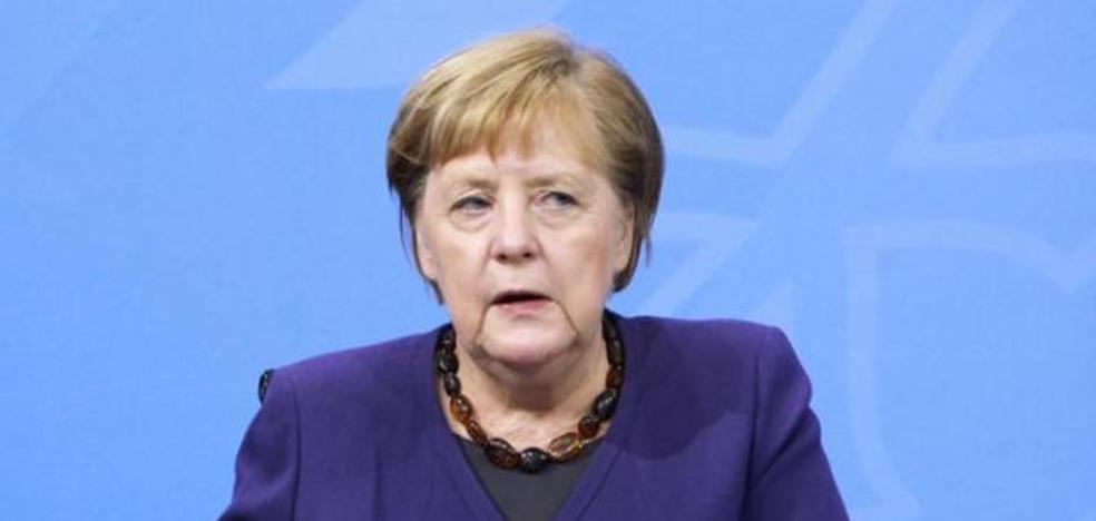 Merkel überreicht dem virtuellen neuen Präsidenten der deutschen Christdemokraten Kürbisse